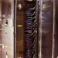 Photographs of a supercomputer being assembled.