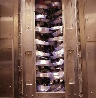 Photographs of a supercomputer being assembled.