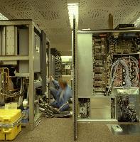 Men setting up supercomputers.