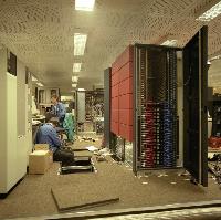 Men setting up supercomputers.