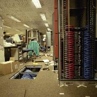 Men setting up supercomputers.