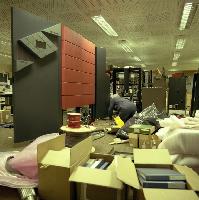 Men setting up supercomputers.