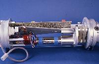 A photograph of some experiments with a device which generates electrical energy from wave kinetic energy.  8 images.