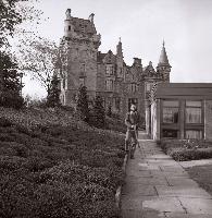Unknown man standing in front of St.Leonard's House, Pollock Halls.