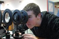 Photographs of David Scott experimenting with the Zeeman Effect (using a static magnetic field to split a spectral line into components), during the 3rd Year Physics laboratories, January 2008.