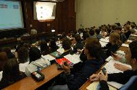 A set of photographs of Professor Simon Bates giving a lecture to a first year physics 1A class in 2005, possibly the first time PRS clickers were used.  Lecture hall was in Appleton tower.