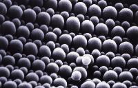 Image taken with an electron microscope, likely of some colloid.