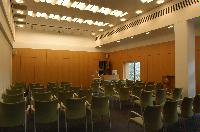 Photographs of a lecture on a planetary science entitled: 'Quaoar, crystalline water ice and all that...' by Helen Brand (UCL) and Helen Maynard (CSEC, UoE). Dr John Loveday is present as possibly the supervisor. The photographs were taken for a brochure in November 2005.