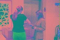 A collection of photographs showing people preparing for the NeSC opening in April 2002.