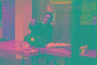 A collection of photographs showing people preparing for the NeSC opening in April 2002.
