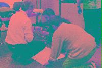 A collection of photographs showing people preparing for the NeSC opening in April 2002.