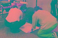 A collection of photographs showing people preparing for the NeSC opening in April 2002.