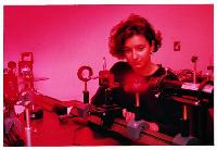 A collection of photographs from the Physics and Astronomy brochure, possibly around 2002.