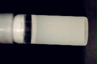 A sequence of photos showing the crystallization and then sedimentation of 2 substances.