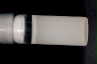 A sequence of photos showing the crystallization and then sedimentation of 2 substances.