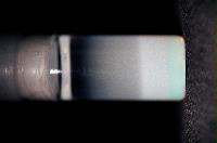 A sequence of photos showing the crystallization and then sedimentation of 2 substances.