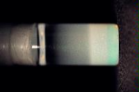 A sequence of photos showing the crystallization and then sedimentation of 2 substances.