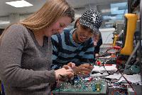 A set of photographs of Martin Reekie and Susan Kivlins in an electronics workshop / laboratory session on 28th November 2008.