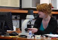 Photographs of Gemma Mackintosh performing an experiment on Brownian motion (seemingly random movement of particles suspended in a fluid), during her 3rd Year Physics laboratories, January 2008.