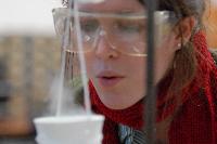 Photographs of Hilary Singer performing a superconductivity experiment, involving levitating magnets, during her 3rd Year Physics laboratories, January 2008. In some of the pictures it is possible to see her lab partner, Robert Dewar, in the background.