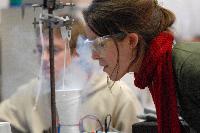 Photographs of Hilary Singer performing a superconductivity experiment, involving levitating magnets, during her 3rd Year Physics laboratories, January 2008. In some of the pictures it is possible to see her lab partner, Robert Dewar, in the background.