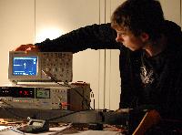 Fraser Thompson and Jay Gillam performing an experiment called "Two Slit Interference: one photon at a time", during their 3rd Year Physics laboratories, January 2008.